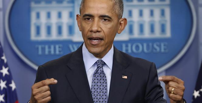 Obama bemoans special interest money in Chicago, will cash $400,000 check on Wall Street